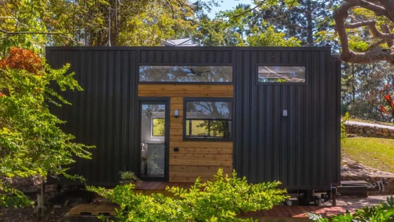 Nobel Tiny House Features Drop-Down Ceiling Bed in Living Room