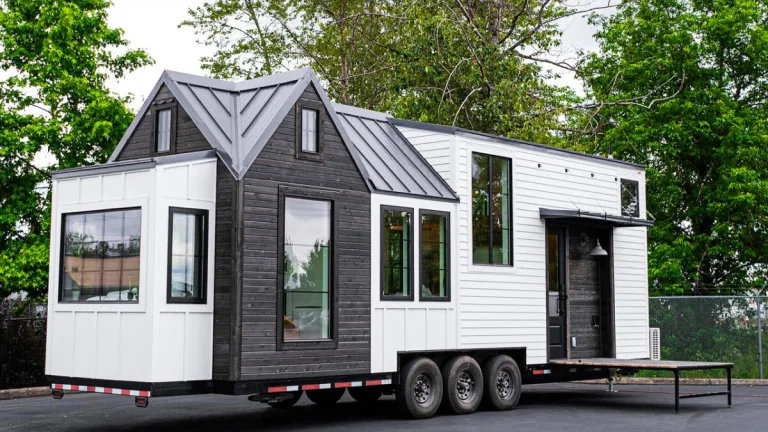 33ft Farmhouse Kootenay Tiny House Flaunts Hydraulic Bed, Fireplace, and Fold-Down Deck