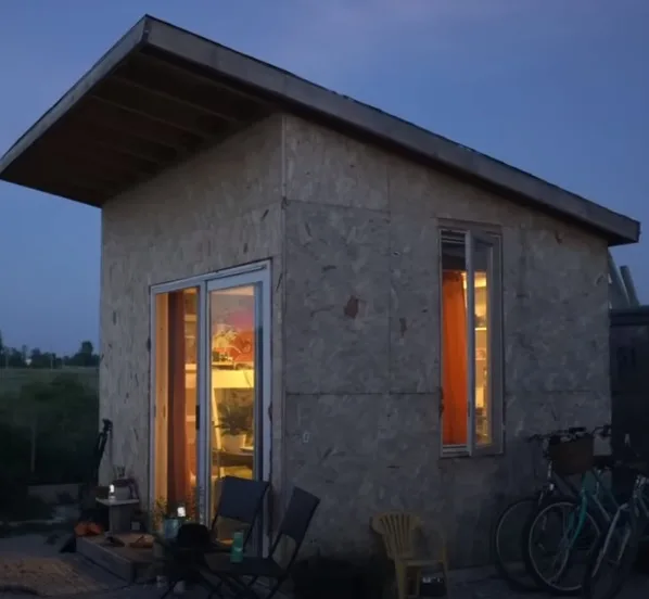 Recently divorced woman moves into 10’x11′ shed and coverts it into lovely tiny home