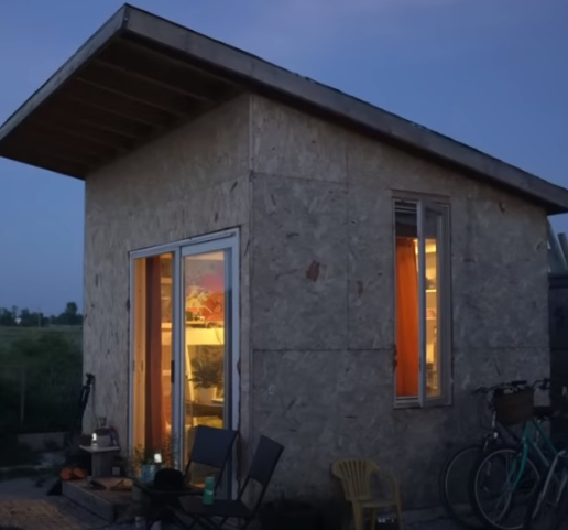 Recently divorced woman moves into 10’x11′ shed and coverts it into lovely tiny home